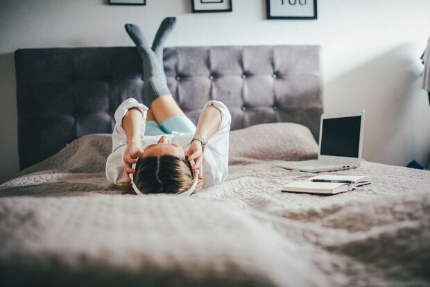 woman listening to music moneyplus woman listening to music songs about money