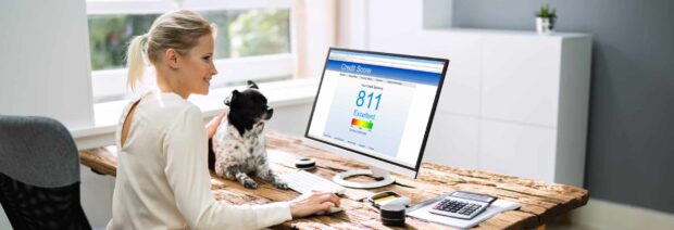 Credit,Score,Check,Online,For,Business,Loan women with dog checking clearscore for creditscore
