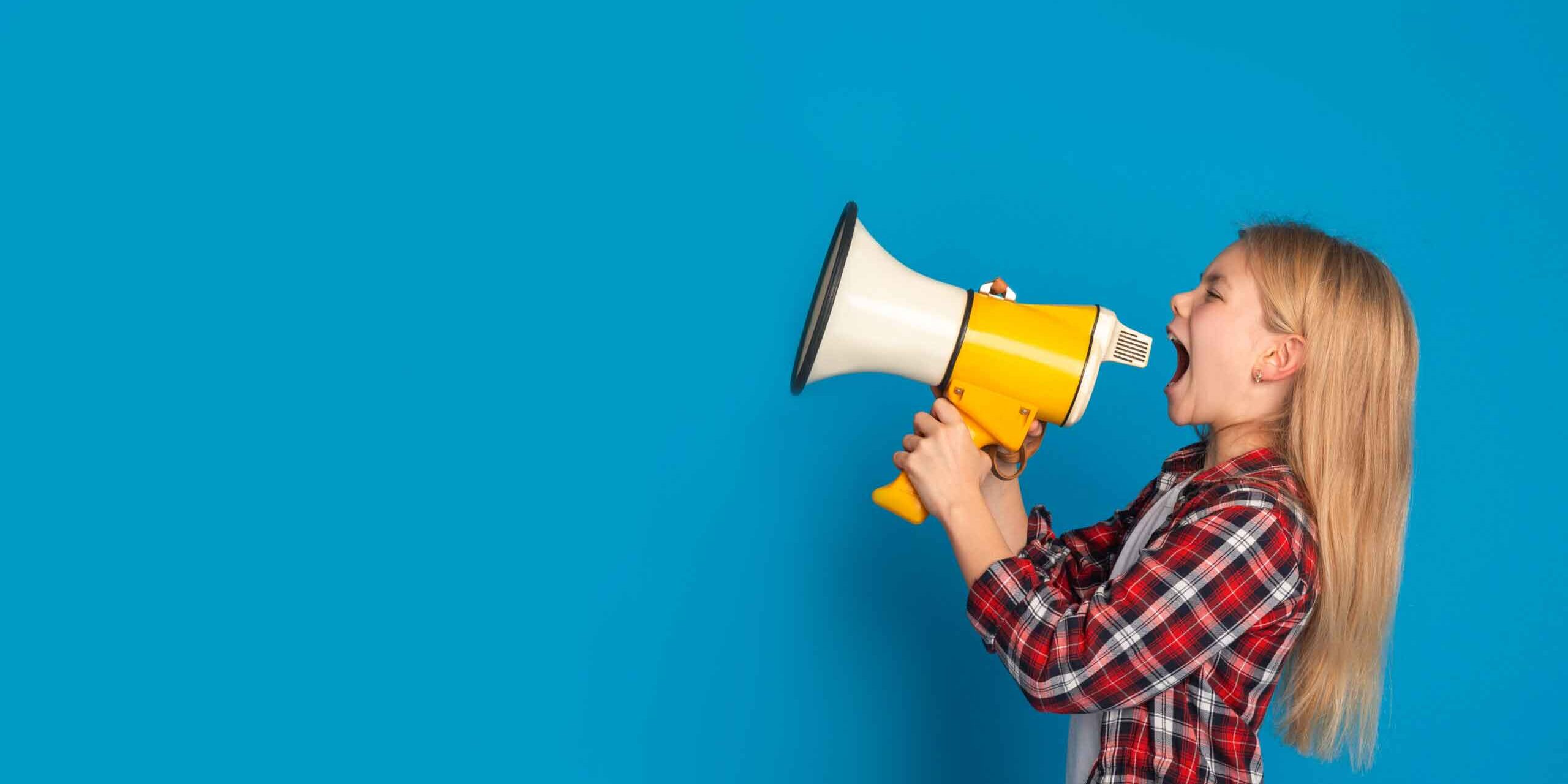 girl-megaphone-scaled