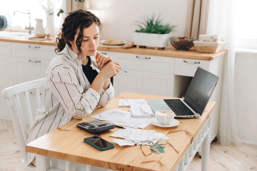 woman looking over her expenses