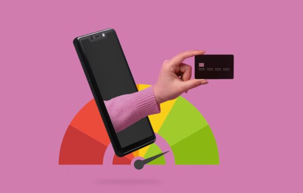 how-to-use-a-credit-card-to-build-credit-feature-1 An image of a colourful credit score meter with an arm holding a credit card poking out of a mobile on a pink background.
