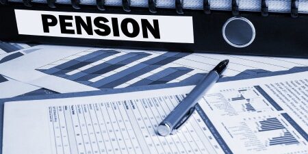 How to find lost pensions feature Image of a black folder with labelled "pension" with a couple of forms and a silver pen.