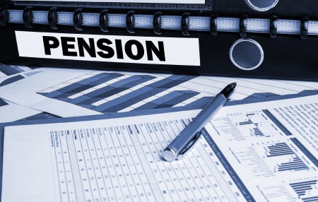 Image of a black folder with labelled "pension" with a couple of forms and a silver pen.