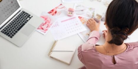 woman-laptop-sm Planning a wedding in 2025 can feel like walking a tightrope between creating your dream day and protecting your financial future. With the cost of living continuing to rise and the price of organising a wedding following suit, more couples are looking for ways to celebrate without starting their marriage under a mountain of credit card or loan debt. However, in the current economic client, this can be much easier said than done. To help you plan the perfect day without breaking the bank, in this guide we explore some of the best ways of planning a wedding on a budget. (H2) What is the average wedding budget? According to a recent survey carried out by professional wedding planners hitched.co.uk, the average wedding in the UK cost £23,250 in 2024. This was 12% up on the average cost of a wedding just one year earlier, and a whopping 34% up since 2021. This average can be a little misleading however, with such a wide spectrum making up the figure. For example, it’s important to note that the same survey found that while 25% of couples spent over £30,000 (and 10% over £40,000), 20% were far more thrifty, only spending between £10,000 - £15,000. (H2) Why do people get into debt over weddings? So, why do so many couples find themselves in debt after their big day? Well, it tends to be down to a mix of factors. First and foremost, costs tend to spiral because weddings are highly emotional occasions, and it's easy to get swept up in the romance of it all, chasing a day in which everything is picture perfect. This can lead to overspending, as couples prioritise creating a magical experience, sometimes without fully considering the financial implications. On top of this, there's also a significant amount of social pressure on couples when it comes to wedding planning nowadays. Many couples feel the need to impress family and friends. And when this is combined with the ‘ideal wedding’ presented on social media and glossy wedding magazines - neither of which exactly promote budget-friendly celebrations - it creates a perfect storm where couples feel compelled to spend far more than they can comfortably afford, often leading them straight into debt. Unexpected expenses are another common pitfall. Even the most meticulous planners can encounter unforeseen costs, such as final alterations to the dress or last-minute unexpected guests. These surprise expenses can throw even the most carefully crafted budget off track, leading to further debt. Finally, the easy availability of credit plays a role to fund weddings and can also fuel the issue. In order to put on the wedding of their dreams, many couples resort to using credit cards or taking out personal loans to finance their weddings. While this may seem like a convenient solution in the short term, it can lead to long-term financial problems. The interest accrued on these debts can be substantial, making it difficult to repay and creating a stressful start to married life. Starting a marriage burdened by debt can impact future financial decisions, such as buying a house or starting a family, and can put a strain on the relationship itself. (H2) How to do a wedding on a budget? Planning a wedding on a budget is doable, but it can be hard work. It requires careful planning, prioritisation, and a willingness to make some compromises. But the reward - starting your married life financially secure - is well worth the effort. Below we provide our top tips for planning a perfect wedding without breaking the bank. (H3) Set a realistic budget This is the most crucial step to planning a wedding. Before you start organising anything, sit down with your partner and honestly assess your finances. From this point, you can determine how much you can realistically afford to spend without going into unmanageable debt. Just be sure to remember to be realistic about your income and expenses, and factor in any existing debts you may be dealing with - both as a couple and independently. Once you have a figure in mind, stick to it! As discussed above, it can be easy to get carried away, but staying within your budget is key to avoiding financial stress. (H3) Limit the guest list One of the biggest wedding expenses is catering. The more guests you invite, the more you’ll spend on food, drinks, and potentially even venue hire. If you are planning a wedding on a tight budget, think about maybe having a smaller, more intimate celebration with your closest family and friends. This not only saves money but can also create a more personal and meaningful experience. (H3) Choose an affordable venue Typically, venue hire makes up the biggest expense when planning a wedding. Indeed, as a general rule, you should be earmarking around half of your total wedding budget for the venue rental and dining services. However, by securing a great value venue, overall costs can be significantly reduced. With this in mind, think about less traditional venues, such as community halls, local parks, or even your own home. These options can be much cheaper than traditional wedding venues like hotels. If you have your heart set on a dedicated wedding venue, consider off-peak times or days of the week, as these are often offered at discounted rates. (H3) DIY invitations and decorations Instead of hiring a professional, consider creating your own invitations and decorations. There are countless DIY tutorials available online, and this can be a fun and creative way to personalise your wedding while saving money. Think about using affordable materials like recycled paper, wildflowers, and homemade decorations and skip the professional decoration hire. (H3) Think about pre-loved/vintage Wedding outfits, especially dresses, can be incredibly expensive. Exploring second-hand or vintage options can be a fantastic way to save money while also finding something unique and potentially even more special. There are many online marketplaces and dedicated vintage shops where you can find beautiful dresses, suits, and accessories at a fraction of the cost of buying new. Plus, it's a more sustainable choice! (H3) Rethink your priorities Decide what elements of your wedding are most important to you and your partner. Are you passionate about having a live band? Or is the food the most important aspect? Once you’ve identified your priorities, allocate your budget accordingly. This exercise will undoubtedly require compromise from both you and your partner, and you might not be able to have everything you’ve ever dreamed of, but ultimately it will help you make informed decisions about where to spend and where to save. By being flexible and willing to adjust your expectations, you can still have a beautiful and memorable wedding without breaking the bank. (H3) Don't be afraid to ask for help Don't be afraid to ask friends and family for help. They may have skills or resources that you can utilise, such as photography, baking, or even just lending a hand with decorations! Although you may find it awkward asking for help, you might be surprised how many of your friends are happy to contribute to a couple's special day. (H3) Track your spending Finally, keep track of all your wedding expenses. This sounds obvious, but you would be amazed how much this simple task can save in the form of accidental overspending and help you avoid any surprises. Use a spreadsheet or a wedding planning app to monitor your spending and make sure you’re not overspending in any area. Remember - your wedding should be about celebrating the beginning of your marriage, not the end of your financial security. Focus on creating moments and memories rather than checking off a list of traditional must-haves. With careful planning and creative thinking, you can create a beautiful celebration without compromising your financial future